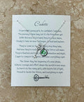 Silver Key Charm Necklace on Card Stock